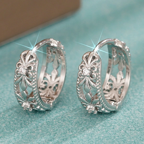 Korean style gentle style earrings for women metal hollow flower Chrome Heart accessories French hot selling jewelry