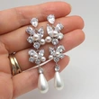 Gentle temperament long earrings flower imitation pearl high-end leaf water drop French earrings wholesale