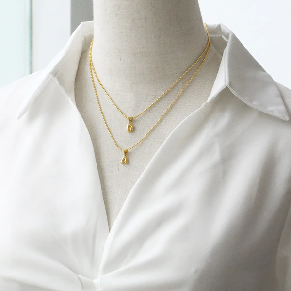 Hot sale 26 letters necklace female copper plated real gold polished letter pendant clavicle chain nkq67