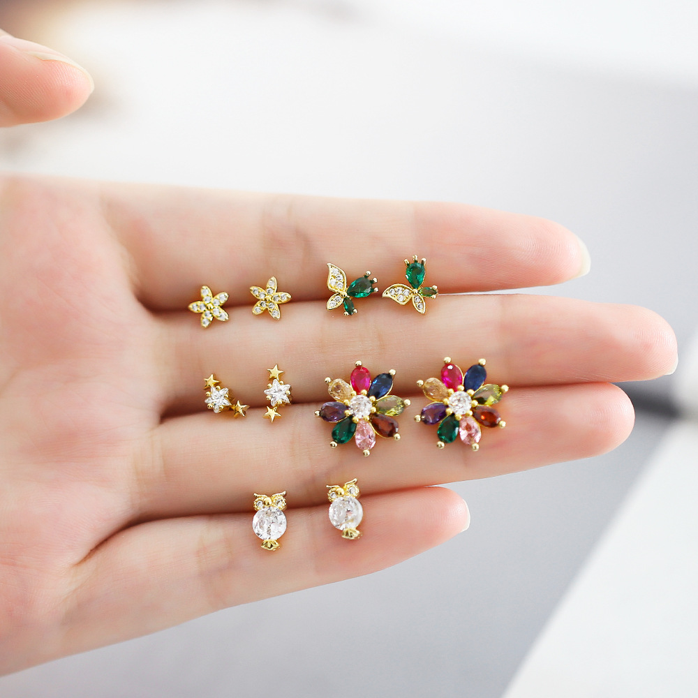 Simple and small star flower butterfly earrings sweet and cute earrings style fashionable all-match ear jewelry ert23