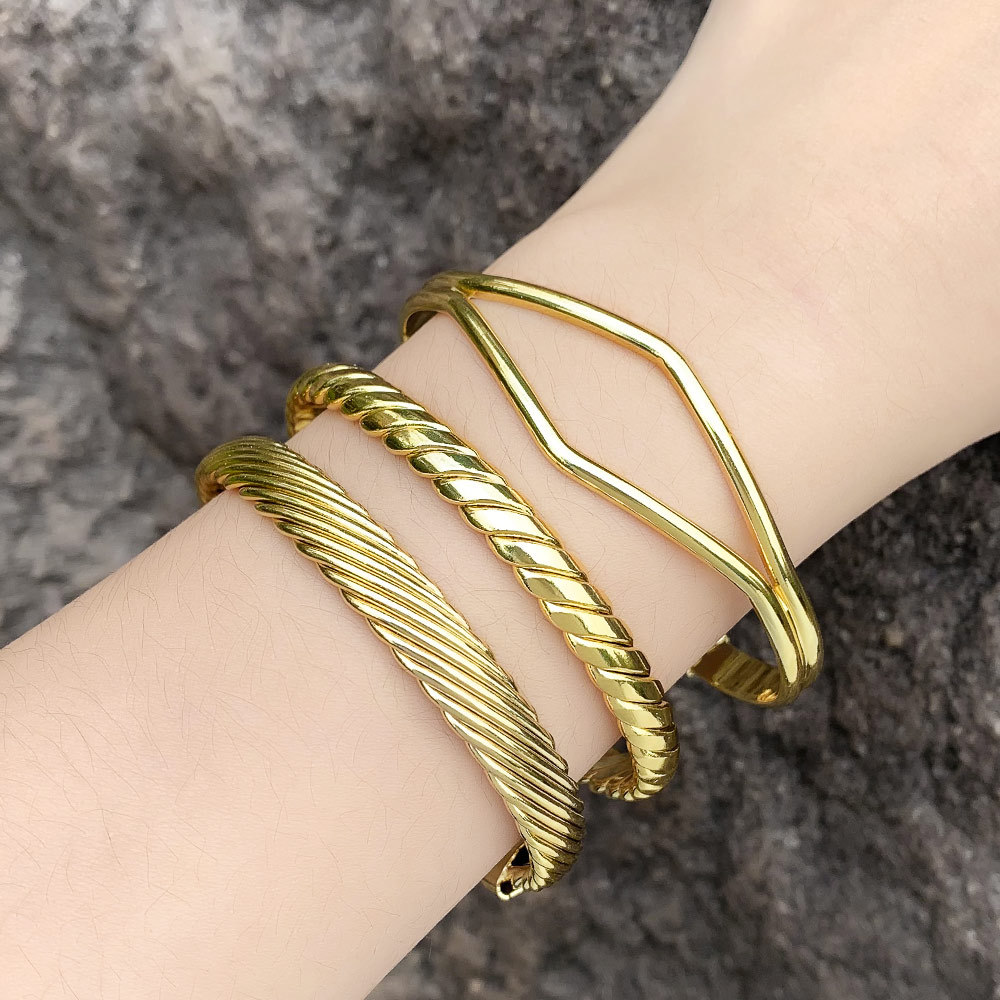 Clearance European and American retro open bracelet copper plated 18K gold hip-hop punk geometric winding twist bracelet female brk53