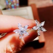 Korean version of the colorful star earrings sweet flower five-pointed star ladies earrings energetic girl student earrings