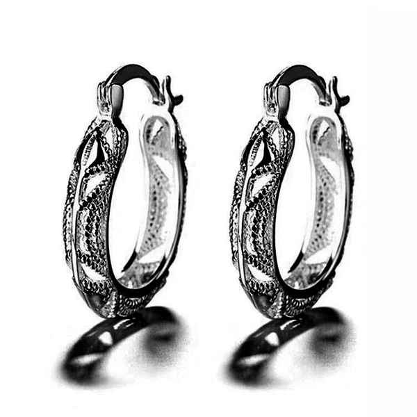 Hot selling e-commerce goods European and American creative simple openwork earrings female personality copper earrings