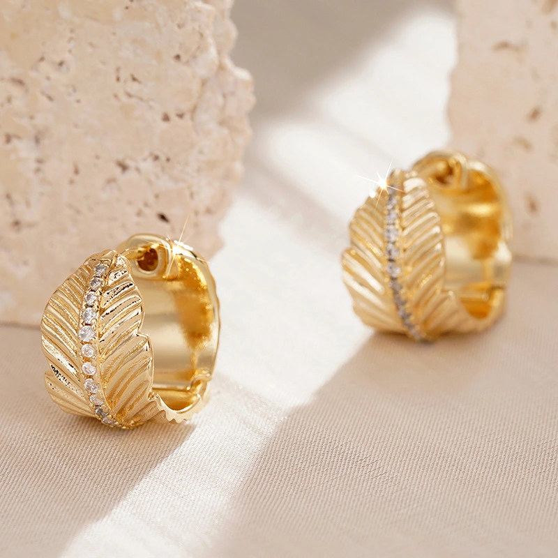 Live hot sale earrings for women with leaf-shaped micro-inlaid zircon imitation gold accessories, French elegant ladies' jewelry