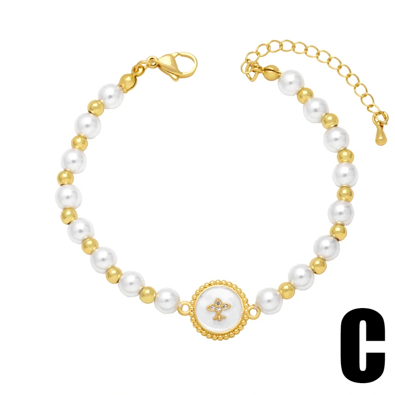 Clearance European and American jewelry style niche oil drop butterfly airplane cross pearl bracelet female brj99