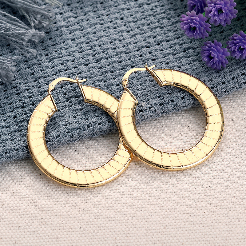 New imitation gold earrings for women with wide stripes, niche design, Asian style