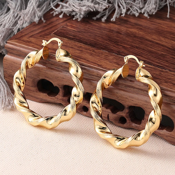 Spiral metal electroplated gold earrings for women, niche design, high-end style earrings, Asian sweet and cool accessories