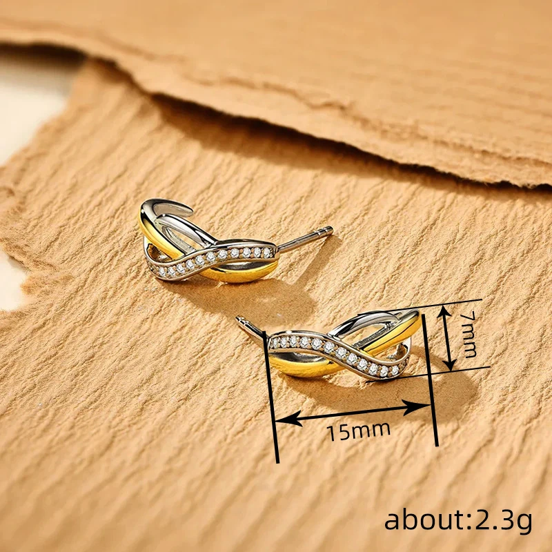   Hot selling metal electroplating two-color earrings fashionable personality cross design fashionable popular super hot style