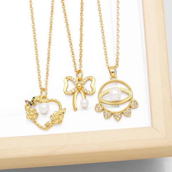 Hot selling pearl necklace women's European and American fashion flower bow pendant clavicle chain nkb832