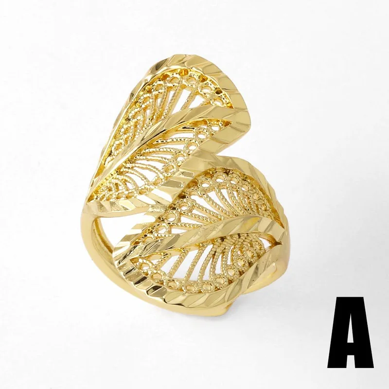 AS jewelry Europe and the United States hot selling hollow round bead ring female copper plated real gold inlaid zircon leaf ring rij59