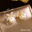 Bowknot diamond imitation pearl female earrings French retro exquisite earrings Japanese and Korean light luxury earrings