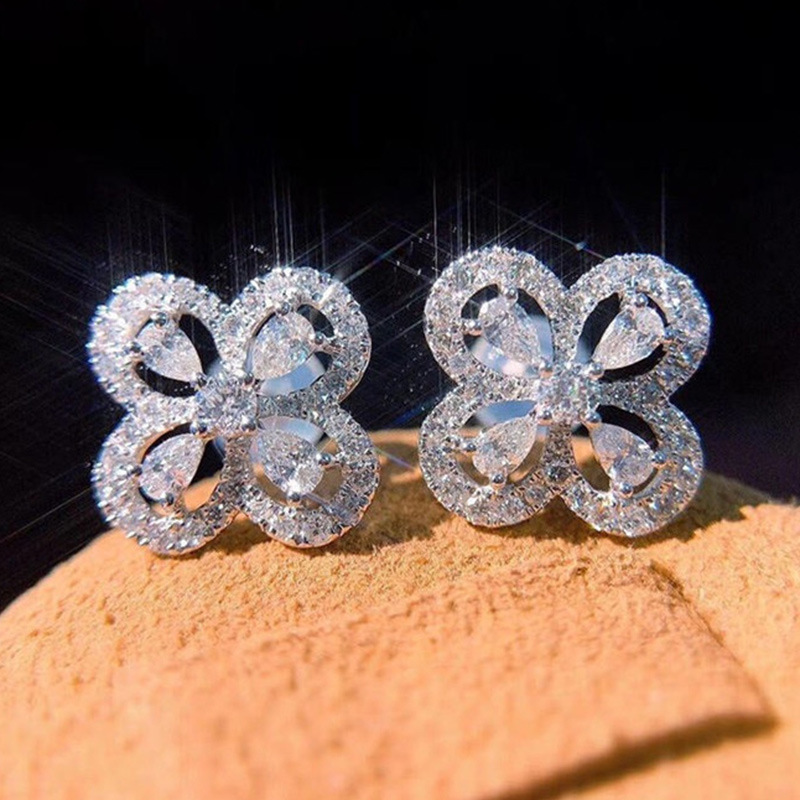 European and American classic four-leaf clover full diamond sequin earrings new floral micro-inlaid zircon earrings fashionable and delicate earrings