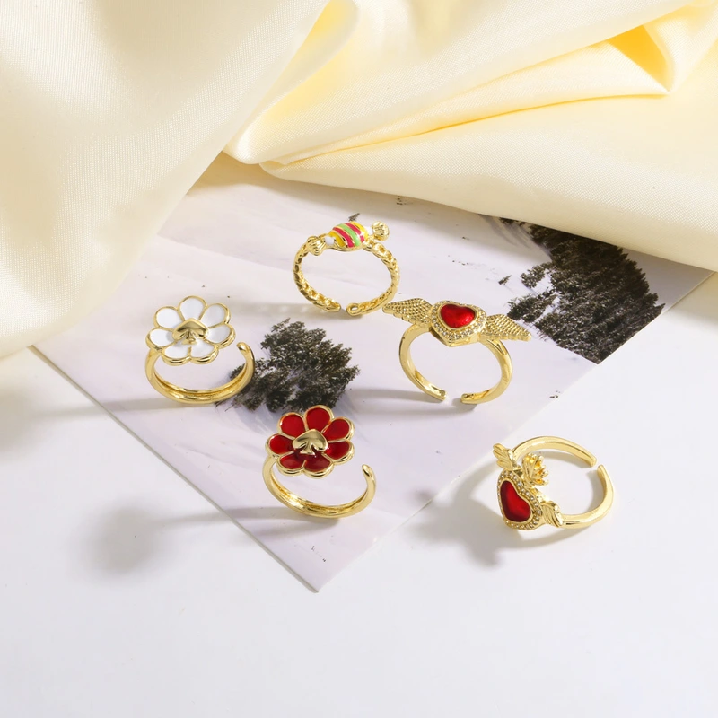 AS jewelry European and American hot-selling copper-plated real gold love wings flower oil drop open ring female riq90