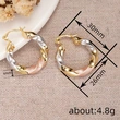 Japanese and Korean gentle style spiral earrings for women metal painting oil three-color jewelry holiday style popular jewelry