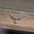  Korean version of the heart pendant female angel wings elegant lady necklace heart-shaped niche o-shaped chain