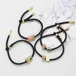 AS jewelry European and American simple fashion pearl dog paw oil drop pendant black hand rope bracelet female bra26