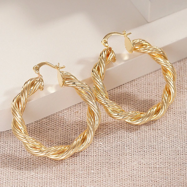 Middle Eastern European and American earrings for women with twisted spiral design, high-end style, super popular