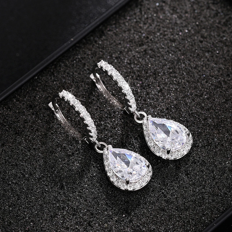 Light luxury water drop design earrings for women inlaid with zircon fashionable geometric earrings popular engagement jewelry