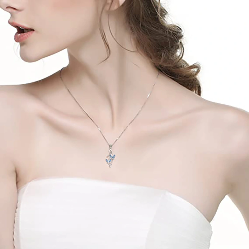 The new style Internet celebrity butterfly pendant flying wings twisted cross necklace is hot selling in Europe and the United States