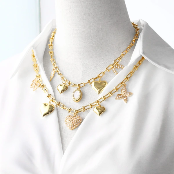 Clearance jewelry Europe and the United States hot selling love pearl butterfly pendant gold-plated necklace bracelet set female nka042