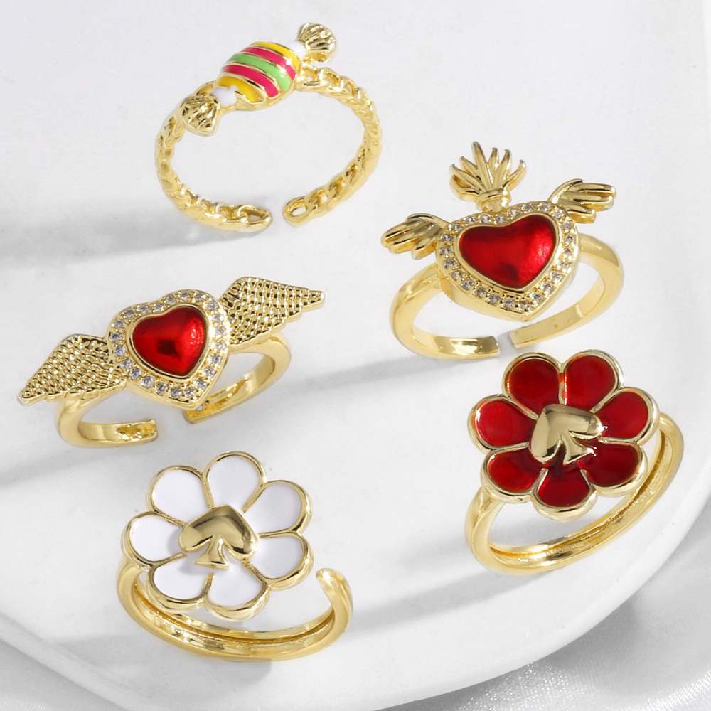 AS jewelry European and American hot-selling copper-plated real gold love wings flower oil drop open ring female riq90