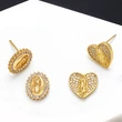 European and American hot-selling jewelry trend geometric round heart-shaped Madonna earrings fashion retro earrings female erq26