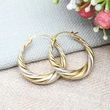 Hot selling European and American metal earrings for women, two-color circle design jewelry, twisted exaggerated personality jewelry