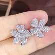   Popular five-petal flower earrings Korean style women's commuter earrings women's high-end exquisite women's earrings