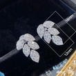 Factory direct sales of creative luxury leaf zircon earrings with copper micro-inlaid zircon for women