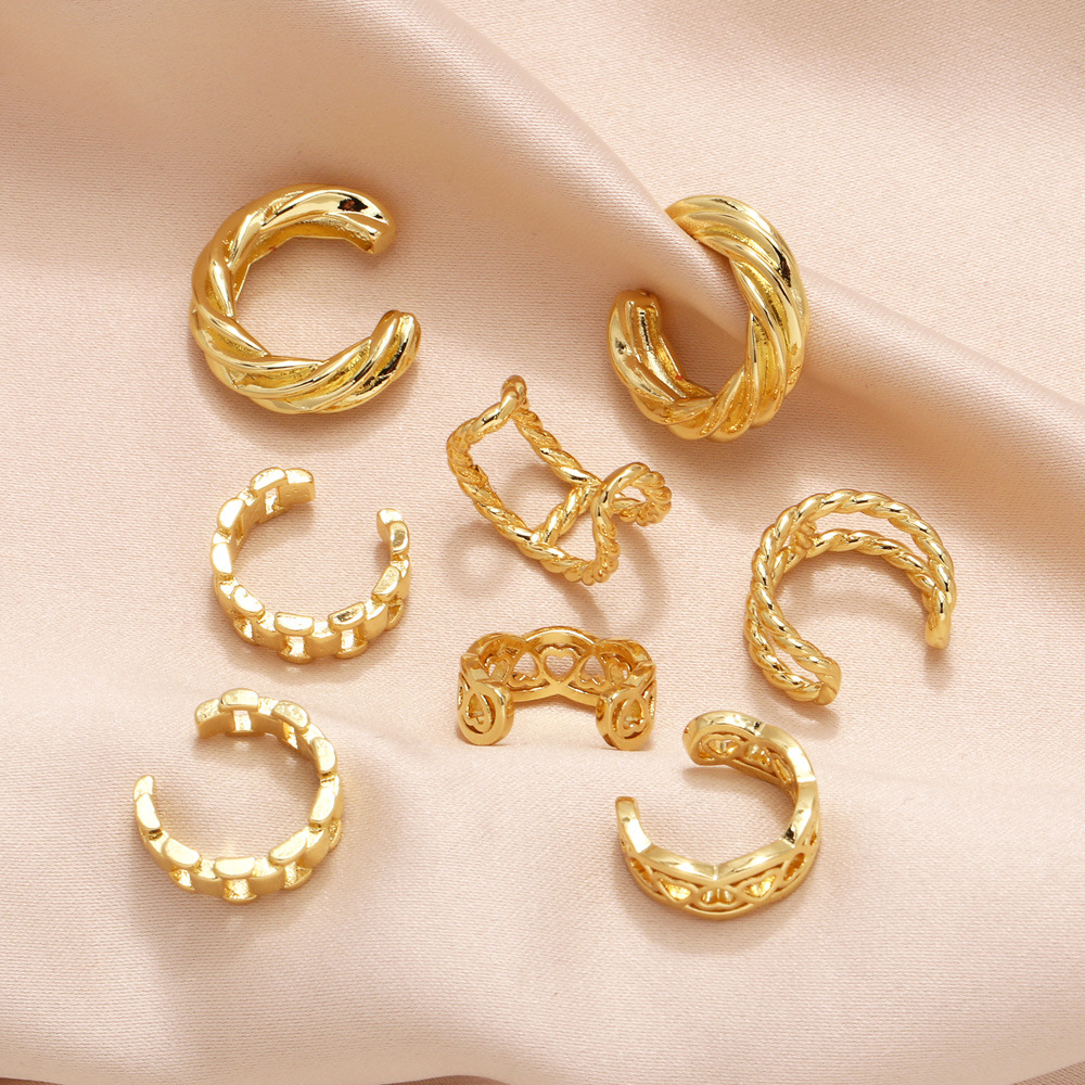 2024 new hollow twist earrings niche retro high-end gold-plated non-pierced ear clips era107