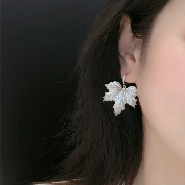 Canadian European and American style maple leaf earrings for women exaggerated atmosphere shining jewelry fashionable and elegant popular hot items