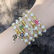 Clearance high-end cross pendant bracelet beaded pearl bracelet female niche girlfriends hand jewelry wholesale brj82