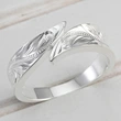  European and American metallic feather ring hip-hop trend single ring personality retro swing arm men and women ring