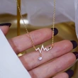 New Japanese and Korean jewelry, light luxury style, niche design, electrocardiogram necklace, diamond-studded wave heartbeat clavicle chain