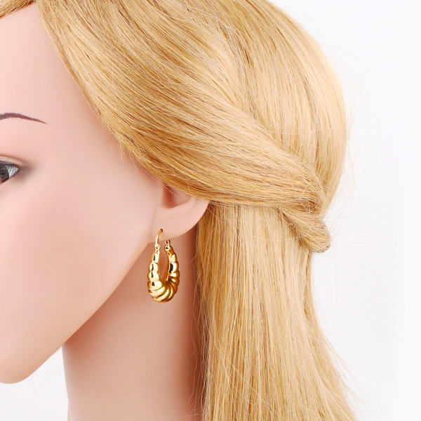 European and American simple fashion 18k gold hollow earrings female niche design round crescent pattern earrings erv09