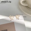 Fashionable autumn and winter new style heart earrings new trend Korean style peach heart earrings for women Western style hot imitation pearl earrings