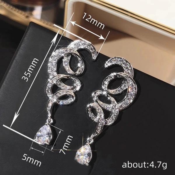  European and American cross-geometric line earrings for women inlaid with zircon, sparkling water drop design earrings for banquets, light luxury style