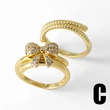 Clearance AS jewelry European and American bow ring female copper plated real gold inlaid zircon double layer ring rik31