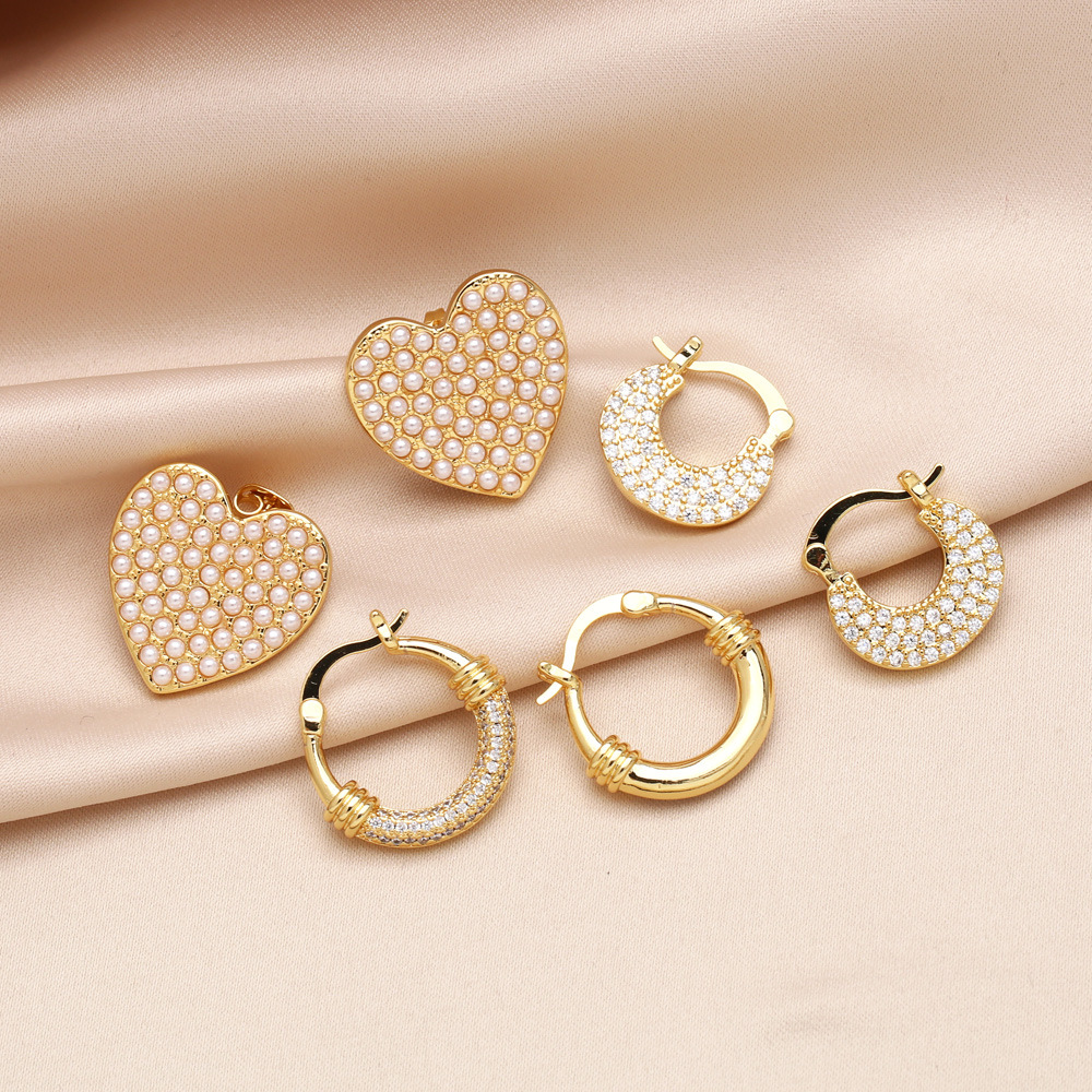 European and American fashion simple pearl heart earrings niche design inlaid zircon gold-plated earrings earrings erw41