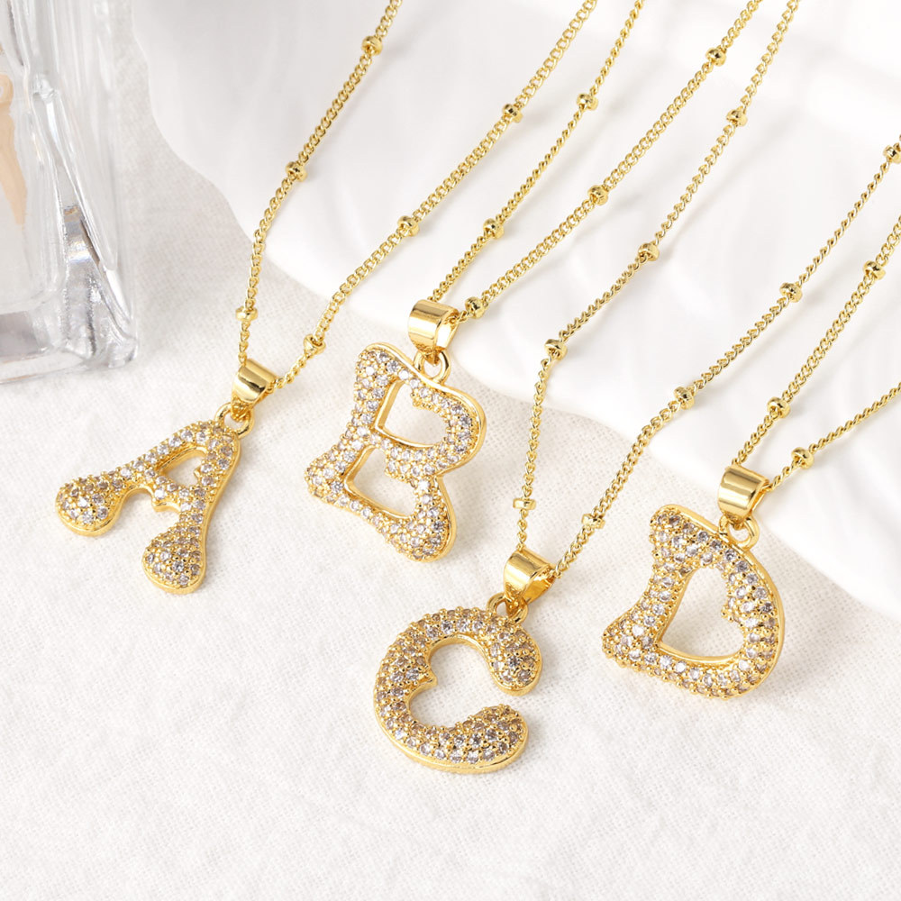 AS jewelry European and American new 26 English letters pendant necklace copper plated 18k gold clavicle chain nkb327