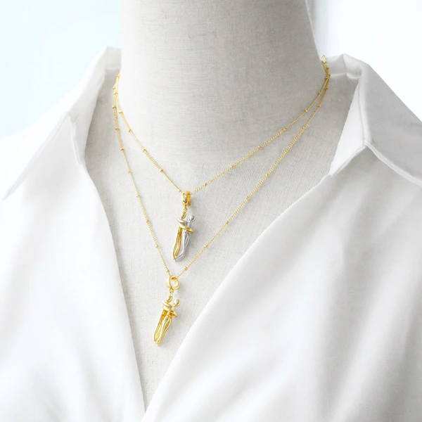 Jewelry European and American two-color couple dance pendant necklace glossy gold-plated clavicle chain nkz67 necklace