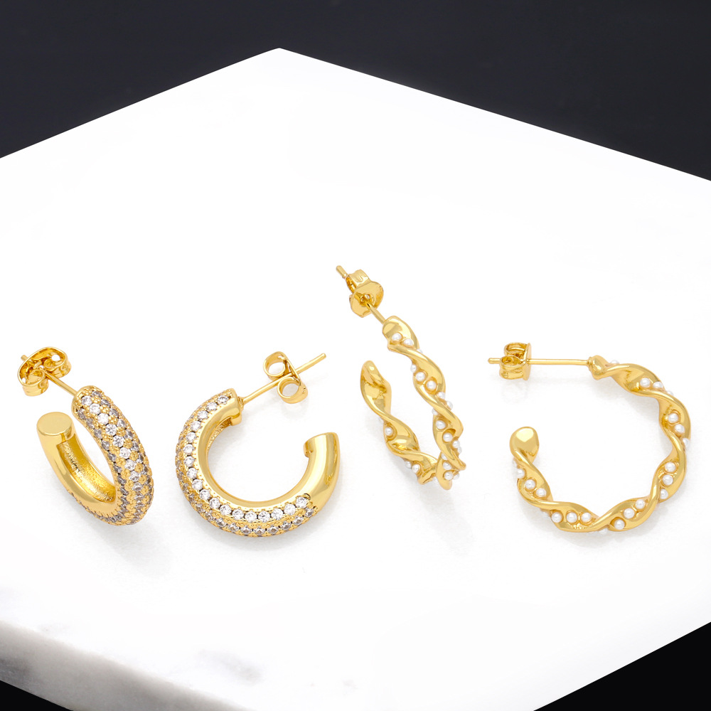 Clearance European and American cold style C-shaped earrings niche irregular twisted imitation pearl earrings ers95