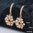  Wihs Korean style earrings fashion hollow sunflower earrings female shiny zircon earrings manufacturers wholesale
