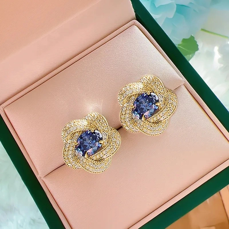  European and American imitation Tanzanite blue earrings egg-shaped temperament celebrity round face flower earrings retro style earrings