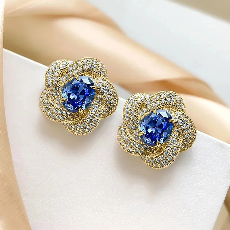  European and American imitation Tanzanite blue earrings egg-shaped temperament celebrity round face flower earrings retro style earrings