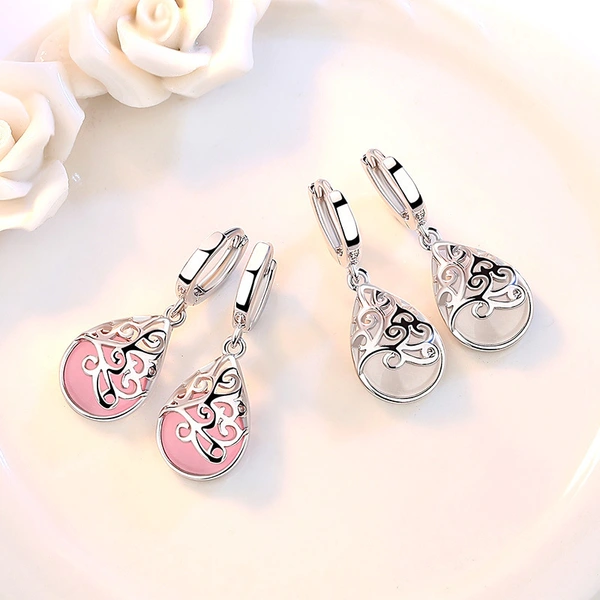 European and American silver-plated earrings imitating moonlight cat's eye stone totem ear clip earrings female wishing pool earrings ear jewelry