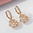  Wihs Korean style earrings fashion hollow sunflower earrings female shiny zircon earrings manufacturers wholesale