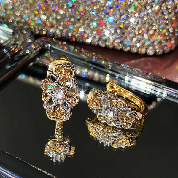 Retro ethnic style earrings exquisite hollow pattern color separation earrings European and American fashion new style earrings