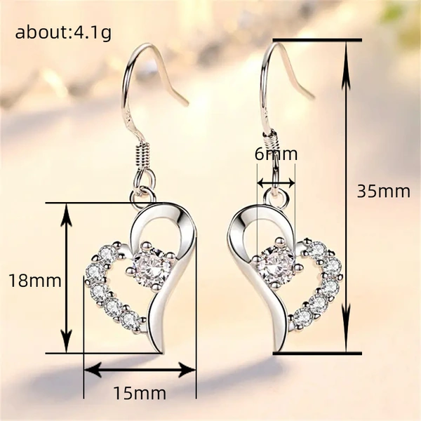  2024 new style trendy heart earrings Korean temperament long style net red earrings round face slimming earrings