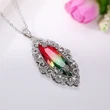 2022 Spring New Natural Series Luxury Hollow Pattern Inlaid Olive Gradient Stone Pendant Necklace
